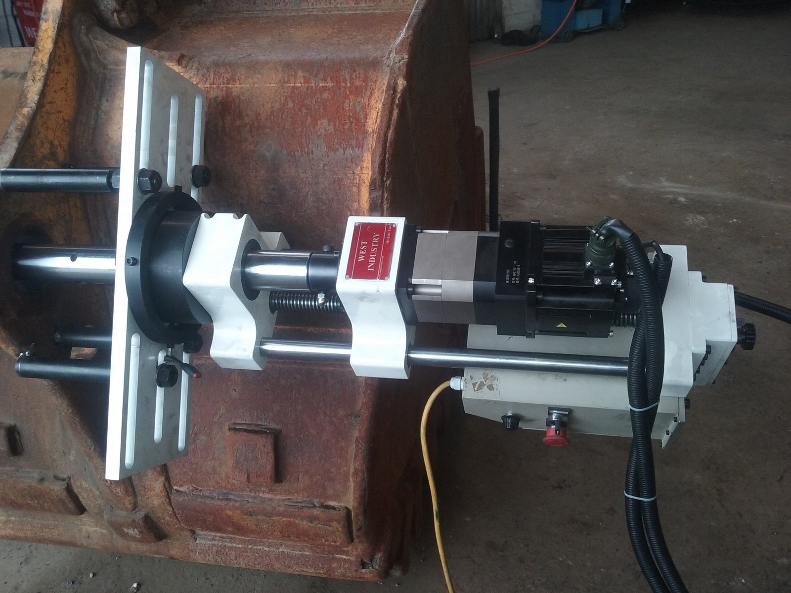 Portable line boring equipment repairing a heavy machinery bore